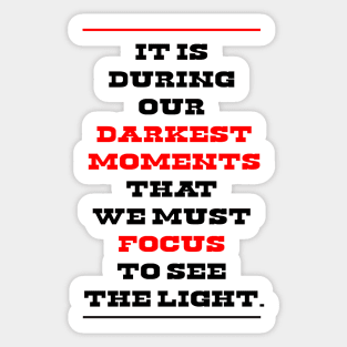 It is during our darkest moments that we must focus to see the light. Sticker